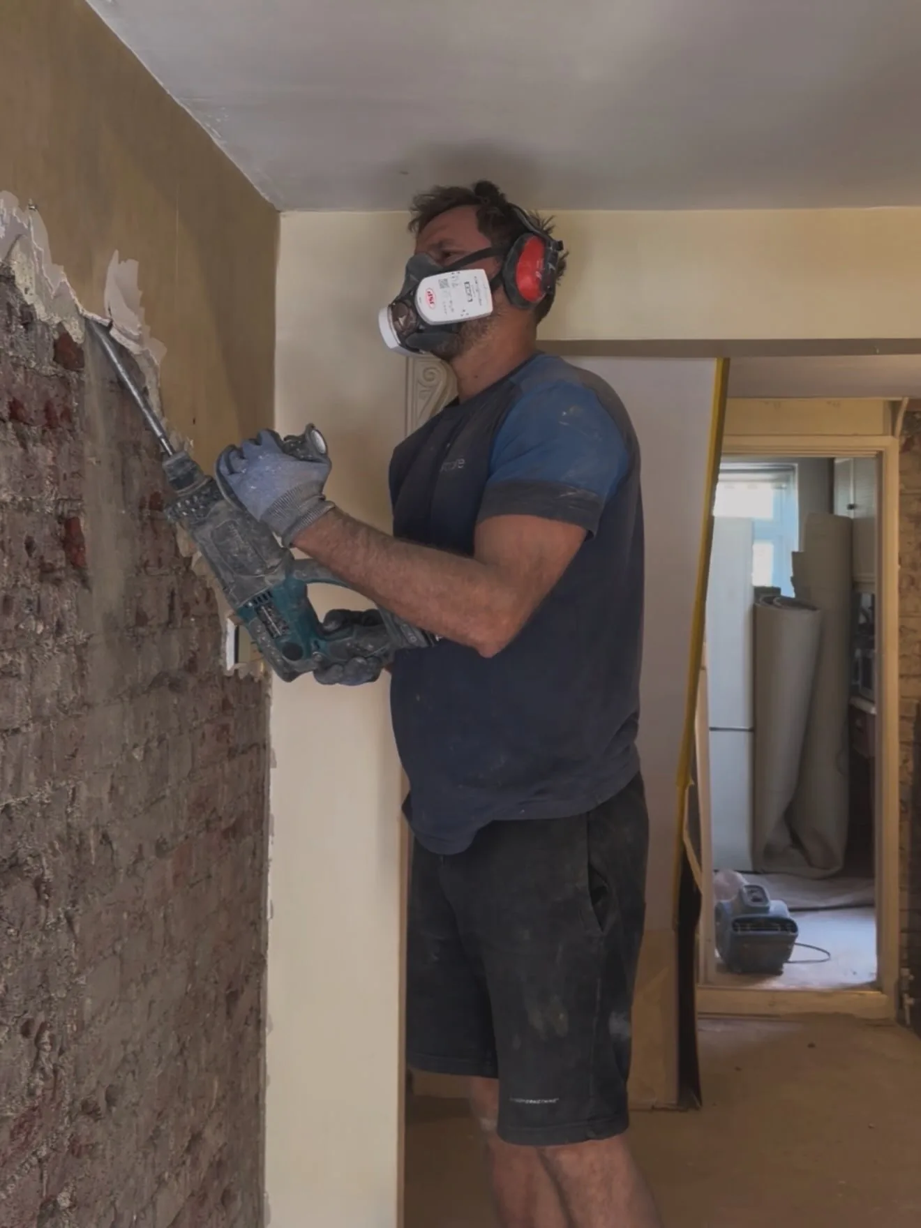 Salt-contaminated plaster removed back to the substrate before replastering